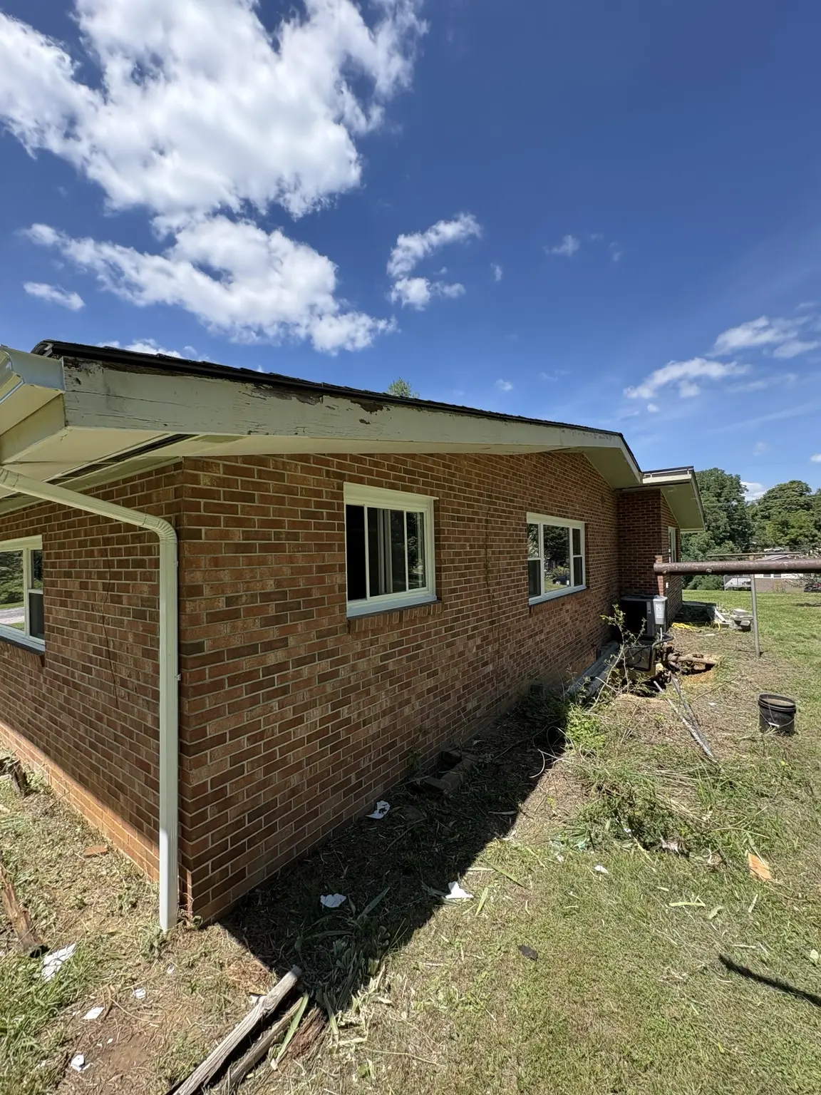 Side exterior of the home before painting